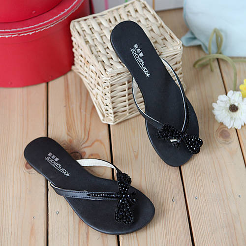 black flat flip flops