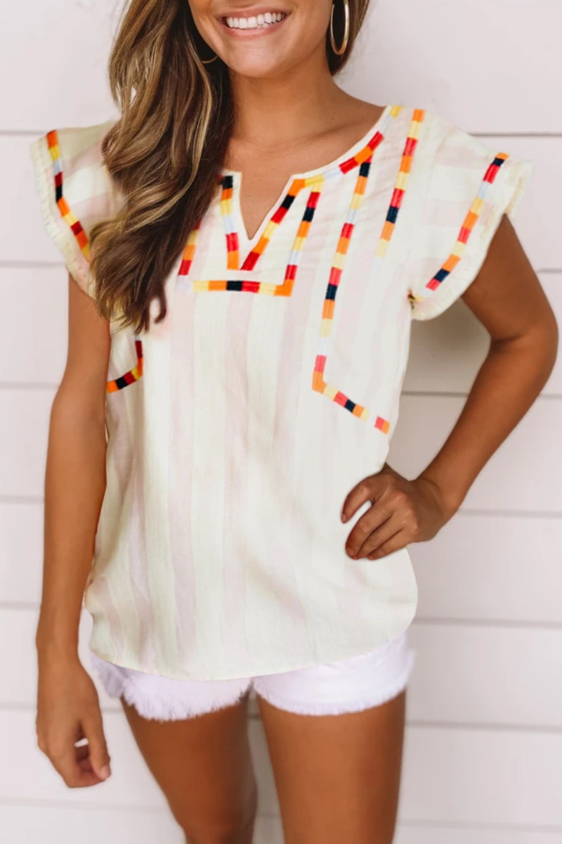 

Lovely Embroidered White Blouse